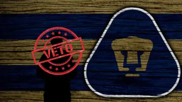 Escudo de Pumas en fondo de pantalla