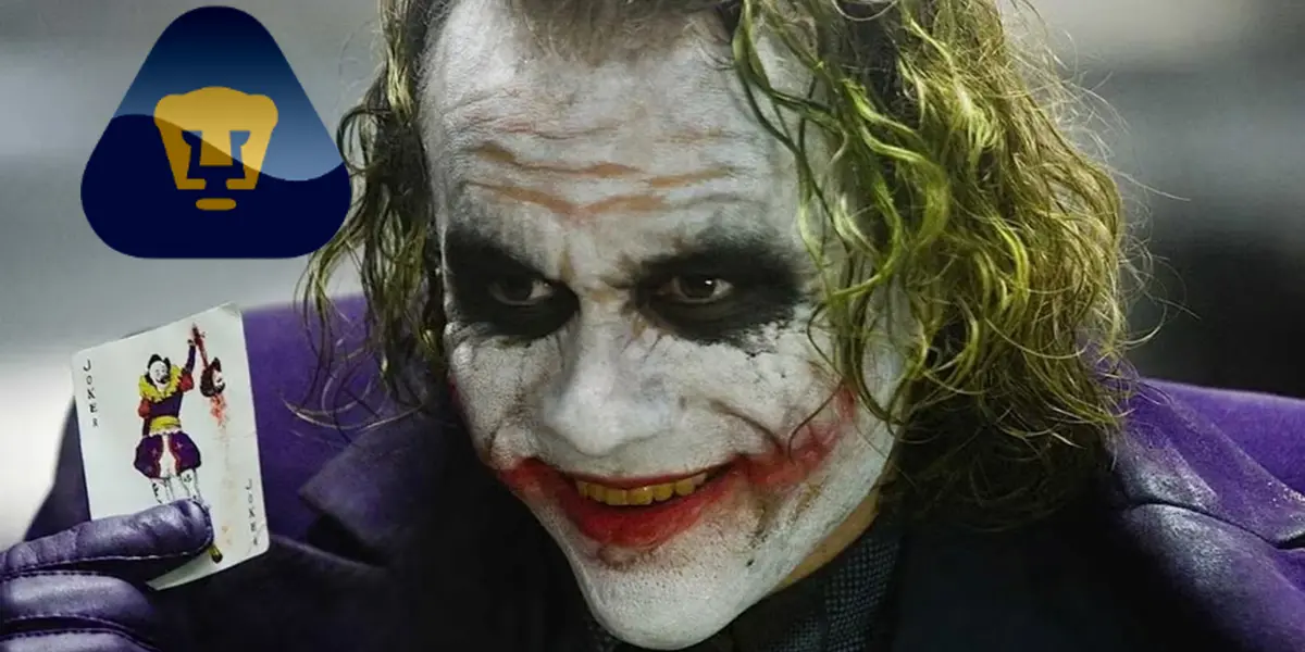 Guasón sostiene una carta en una película de Batman (Fuente: Batman)