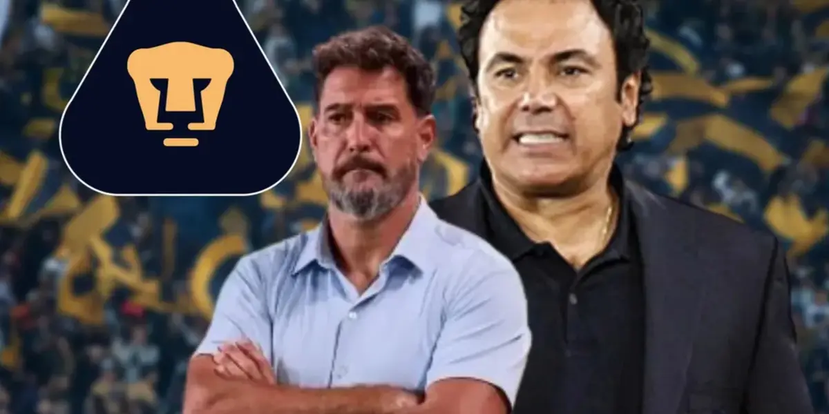 Gustavo Lema mira un juego de Pumas, de fondo, Hugo Sánchez molesto (Fuente: Mexsports)