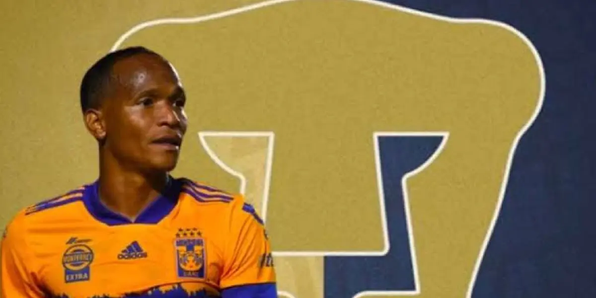 Luis Quiñones con Tigres y escudo de Pumas