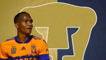 Luis Quiñones con Tigres y escudo de Pumas